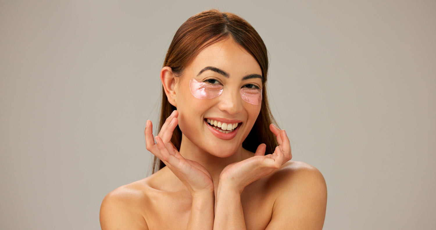 Smiling woman applying skincare mask - rewards club for Luminous Loom